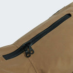 Detail image of dog raincoat in a light brown colour