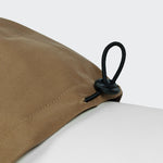 Detail image of dog raincoat in a light brown colour