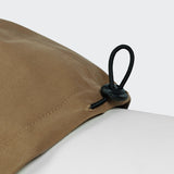 Detail image of dog raincoat in a light brown colour
