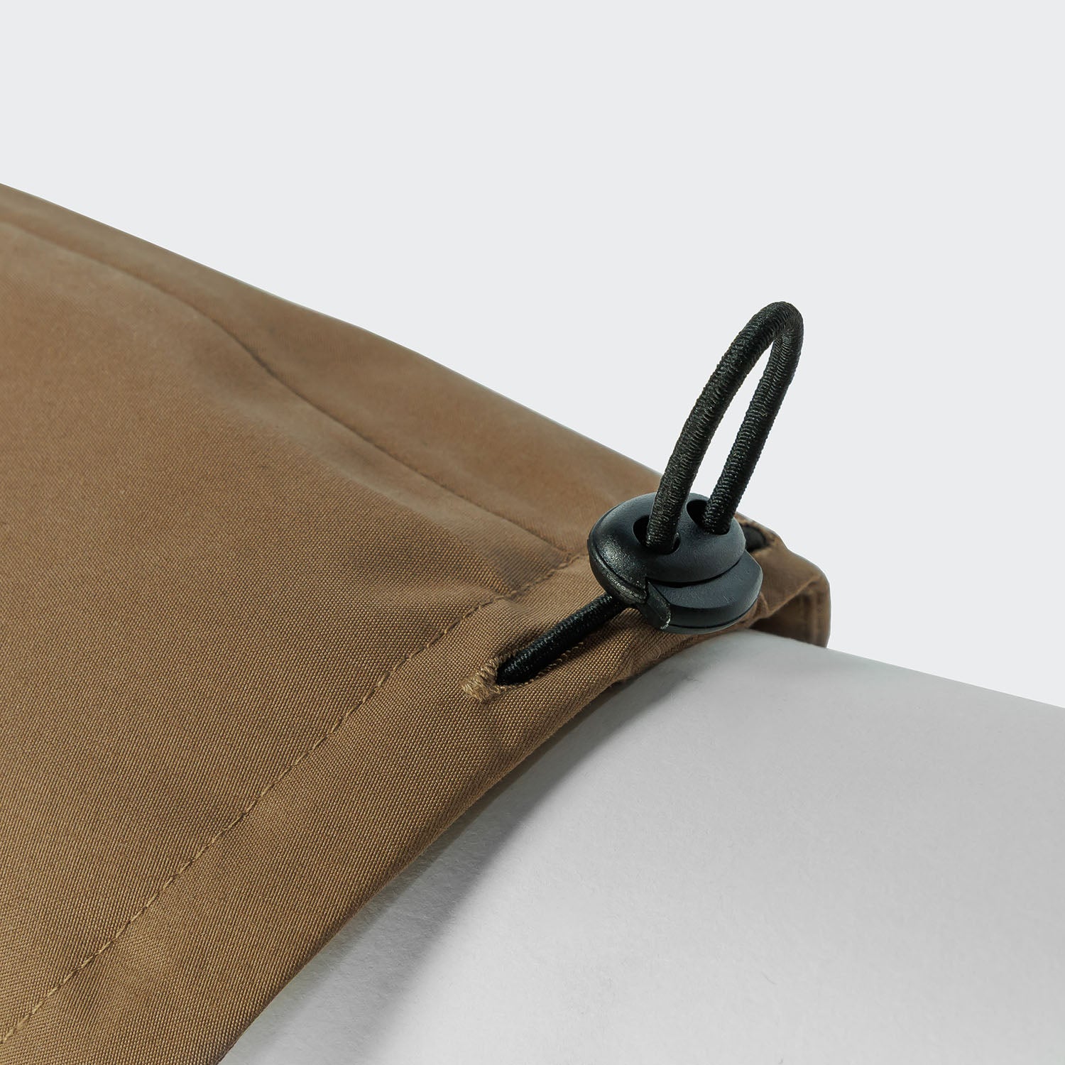Detail image of dog raincoat in a light brown colour