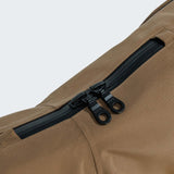 Detail image of dog raincoat in a light brown colour