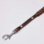 brown braided leather dog leash with silver snap hook