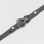 Close-up braided details grey leather leash for dogs