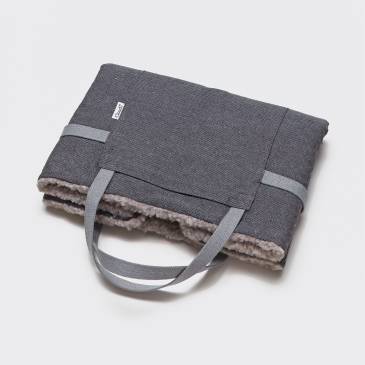foldable grey travel bed with wool inside