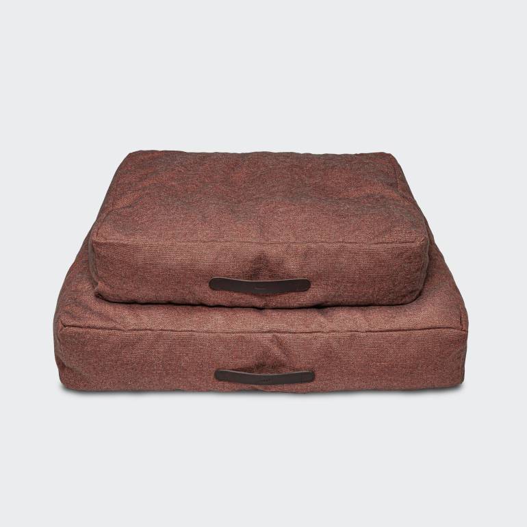 Two red dog beds